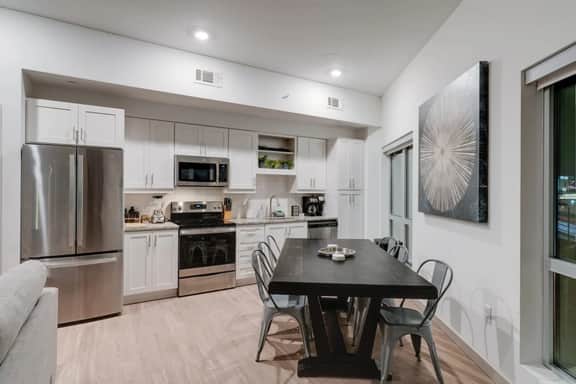 SoBro 2BR Skyline Views | Pool + Gym - Image 4